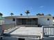 Backyard with wooden deck and screened-in porch, perfect for outdoor enjoyment at 8422 Boxwood Dr, Tampa, FL 33615