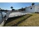 Backyard showcasing dock on waterfront, perfect for boating enthusiasts at 8422 Boxwood Dr, Tampa, FL 33615