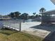 Waterfront backyard with wooden deck, offering serene views at 8422 Boxwood Dr, Tampa, FL 33615
