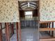 Kitchen space with cabinetry and tile flooring ready for renovation to make your own at 8422 Boxwood Dr, Tampa, FL 33615