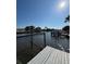 Waterfront view featuring dock and boat, ideal for water activities at 8422 Boxwood Dr, Tampa, FL 33615
