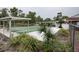 Community shuffleboard courts, surrounded by lush vegetation, offer a fun and active recreational space at 8913 Welsh Way, Hudson, FL 34667