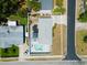 Overhead view of the property highlighting the house, yard, pool, and outdoor spaces at 895 Joan St, Dunedin, FL 34698