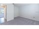 Empty bedroom with neutral carpet and natural lighting at 9220 Dayflower Dr, Tampa, FL 33647