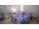 Decorated bedroom with themed decor, plush toys, and a comfortable bed at 923 Whimbrel Run, Bradenton, FL 34212