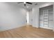 Bedroom featuring a ceiling fan, closet, and neutral walls at 925 E Chelsea St, Tampa, FL 33603