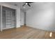 Bedroom featuring a ceiling fan and an open closet at 925 E Chelsea St, Tampa, FL 33603
