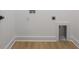 Laundry room hookups and floor drain in a clean, bright, and open space at 925 E Chelsea St, Tampa, FL 33603