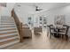 Bright living room featuring a staircase, modern furniture and plenty of natural light at 925 E Chelsea St, Tampa, FL 33603