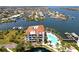 Waterfront condo with pool, pond, and boat docks in a tropical setting at 1003 Bellasol Way # 9203, Apollo Beach, FL 33572
