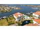 Beautiful waterfront condo with lush landscaping, community pool, and marina access at 1003 Bellasol Way # 9203, Apollo Beach, FL 33572
