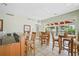 Relaxed bar area with seating and access to outdoor recreation at 1003 Bellasol Way # 9203, Apollo Beach, FL 33572
