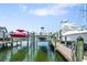 Boat lifts on the water offer convenient access to boating and water activities at 1003 Bellasol Way # 9203, Apollo Beach, FL 33572