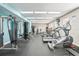 Fully equipped gym with treadmills, weight machines, and ample space for a complete workout at 1003 Bellasol Way # 9203, Apollo Beach, FL 33572