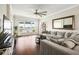 Inviting living room featuring a large window with waterfront views and comfortable seating at 1003 Bellasol Way # 9203, Apollo Beach, FL 33572