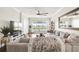 Bright living room with modern decor and water views at 1003 Bellasol Way # 9203, Apollo Beach, FL 33572
