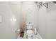 Stylish powder room with modern fixtures, marble floors, and decorative accents creates a chic ambiance at 1003 Bellasol Way # 9203, Apollo Beach, FL 33572