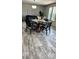 Dining area featuring modern furnishings and ample natural light at 10030 Lake Dr, Weeki Wachee, FL 34613