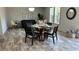 Dining area featuring modern furnishings and ample natural light at 10030 Lake Dr, Weeki Wachee, FL 34613
