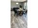 Dining area featuring modern furnishings and ample natural light at 10030 Lake Dr, Weeki Wachee, FL 34613
