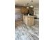 Spacious kitchen island with modern finishes and seamless flow to living area at 10030 Lake Dr, Weeki Wachee, FL 34613