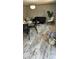 Bright living area featuring modern decor, stylish seating, and an inviting open space at 10030 Lake Dr, Weeki Wachee, FL 34613