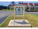 Long Bayou Building 6 sign nestled in a beautifully landscaped area at 10037 62Nd N Ter # 9, St Petersburg, FL 33708