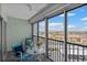 Relax on this balcony with seating and enjoy the panoramic city views at 10355 Paradise Blvd # 412, Treasure Island, FL 33706