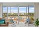 Charming balcony view with outdoor seating providing an exceptional outdoor living space at 10355 Paradise Blvd # 412, Treasure Island, FL 33706