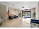 Spacious lobby area with tile flooring, comfortable seating, and a view of the building entrance at 10355 Paradise Blvd # 412, Treasure Island, FL 33706