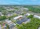 An aerial view of condos located near highways, shopping, and surrounded by green spaces at 1100 E Bay Dr # 60, Largo, FL 33770