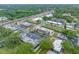 Aerial view shows the location of the condos near green spaces, shopping, and highways at 1100 E Bay Dr # 60, Largo, FL 33770