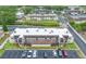 Inviting multi-Gathering building featuring manicured landscaping, ample parking, and a freshly painted roof, perfect for modern living at 1100 E Bay Dr # 60, Largo, FL 33770