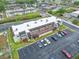 Inviting multi-Gathering building featuring manicured landscaping, ample parking, and a freshly painted roof, perfect for modern living at 1100 E Bay Dr # 60, Largo, FL 33770