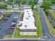 Inviting multi-Gathering building featuring manicured landscaping, ample parking, and a freshly painted roof, perfect for modern living at 1100 E Bay Dr # 60, Largo, FL 33770