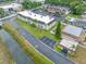 Inviting multi-Gathering building featuring manicured landscaping, ample parking, and a freshly painted roof, perfect for modern living at 1100 E Bay Dr # 60, Largo, FL 33770