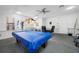 Community game room with pool table, and tables and chairs at 1100 E Bay Dr # 60, Largo, FL 33770