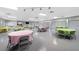Expansive room with lots of natural light, showcasing a variety of tables and chairs for large gatherings at 1100 E Bay Dr # 60, Largo, FL 33770