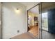 View of the patio through the sliding glass door, showcasing outdoor lighting and privacy at 1100 E Bay Dr # 60, Largo, FL 33770
