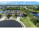 Aerial view of a well-maintained house on a cul-de-sac with a scenic water view at 11320 Lazy Hickory Ln, Tampa, FL 33635