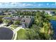 Beautiful aerial view of the home situated on a cul-de-sac, backing onto a tranquil pond at 11320 Lazy Hickory Ln, Tampa, FL 33635
