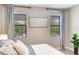 Bedroom windows offering natural light and views of the outdoor space at 11320 Lazy Hickory Ln, Tampa, FL 33635