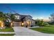 Beautiful two-story home with a well-manicured lawn and a charming front yard at 11320 Lazy Hickory Ln, Tampa, FL 33635