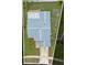 Aerial view of home showcasing backyard, new roof, and landscaping on a well-maintained lot at 11619 Fox Creek Dr, Tampa, FL 33635