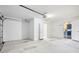 Large garage provides versatile space for vehicles and projects, next to kitchen at 11619 Fox Creek Dr, Tampa, FL 33635