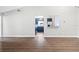 Modern living room features sleek flooring, a breakfast bar, and a bright, airy atmosphere at 11619 Fox Creek Dr, Tampa, FL 33635