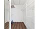 Spacious walk-in closet with white wire shelving and hardwood flooring at 11619 Fox Creek Dr, Tampa, FL 33635