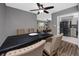 Modern dining room with a black table, upholstered chairs, and view to the living room at 119 N Hillcrest Ave, Clearwater, FL 33755