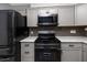 Kitchen showcasing new appliances and stone countertops at 119 N Hillcrest Ave, Clearwater, FL 33755