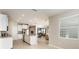 Bright kitchen with stainless steel appliances, center island, and open layout at 12436 Shining Willow St, Riverview, FL 33579